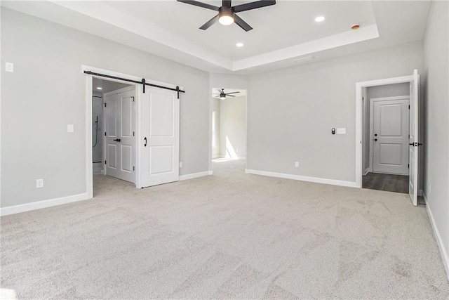 bathroom with marble finish floor, a soaking tub, and vanity
