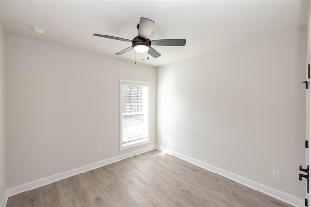 unfurnished room featuring ceiling fan and light hardwood / wood-style flooring