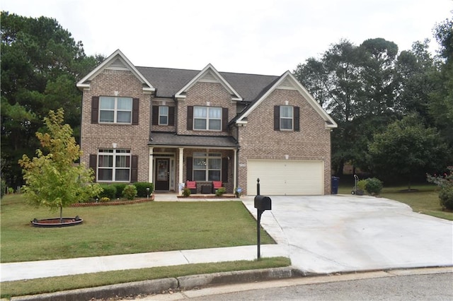 craftsman house featuring a front lawn and a garage