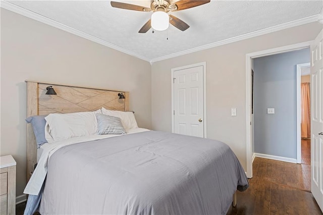 bedroom with ceiling fan, crown molding, dark hardwood / wood-style flooring, and a textured ceiling