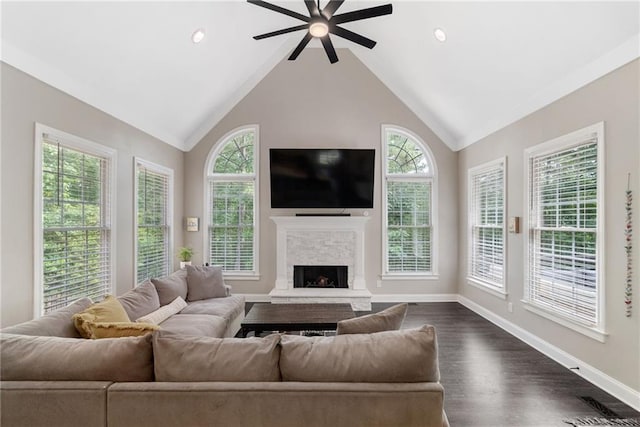5041 Corinault Pl NW, Acworth, GA 30101 - living area featuring a ceiling fan, baseboards, a fireplace, vaulted ceiling, and dark wood-type flooring