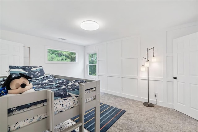 5041 Corinault Pl NW, Acworth, GA 30101 - carpeted bedroom with a decorative wall
