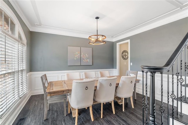 5041 Corinault Pl NW, Acworth, GA 30101 - dining room with a chandelier, wood finished floors, ornamental molding, wainscoting, and a decorative wall