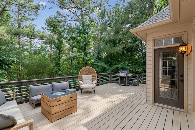 5041 Corinault Pl NW, Acworth, GA 30101 - deck featuring area for grilling, an outdoor living space with a fire pit, and view of scattered trees