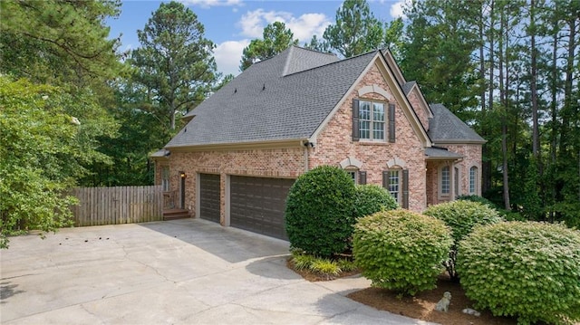 5041 Corinault Pl NW, Acworth, GA 30101 - view of property exterior with brick siding, driveway, an attached garage, and roof with shingles