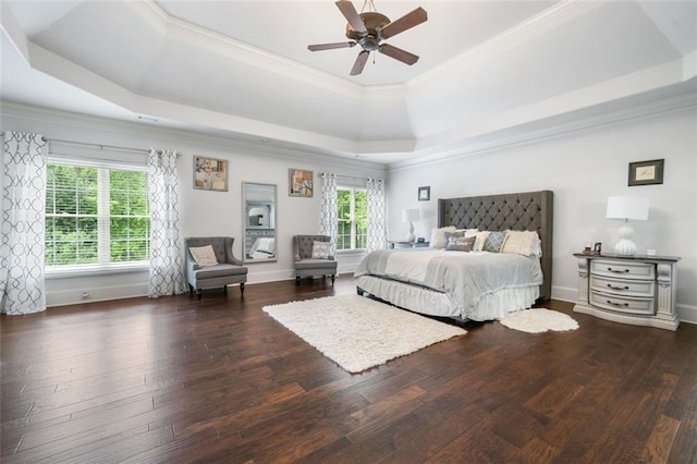 882 Hallbrook Ln, Milton, GA 30004 - bedroom featuring a tray ceiling, wood finished floors, crown molding, and a ceiling fan
