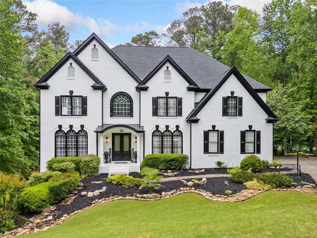 882 Hallbrook Ln, Milton, GA 30004 - french country home with french doors and a front lawn