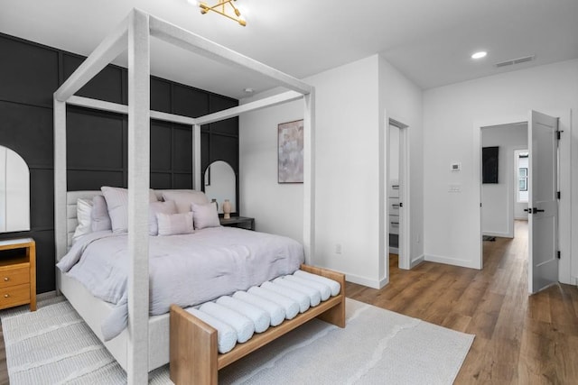 bedroom featuring hardwood / wood-style floors