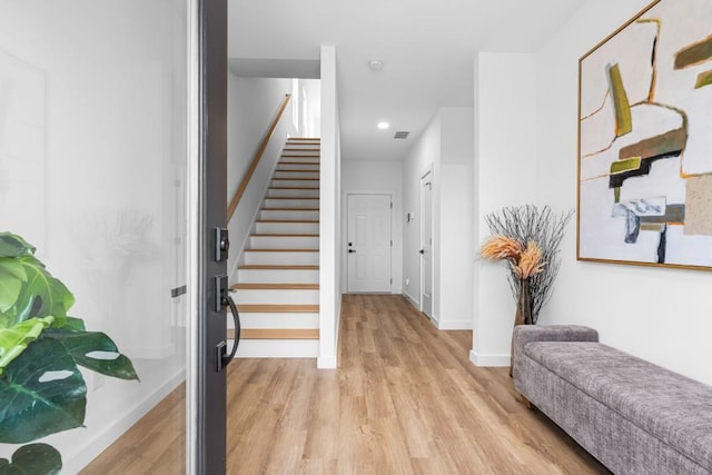 entrance foyer featuring light hardwood / wood-style floors