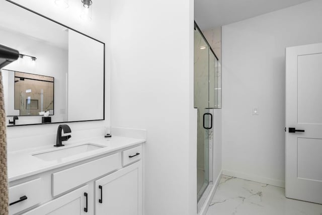 bathroom with an enclosed shower and vanity