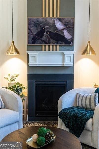 sitting room featuring a fireplace