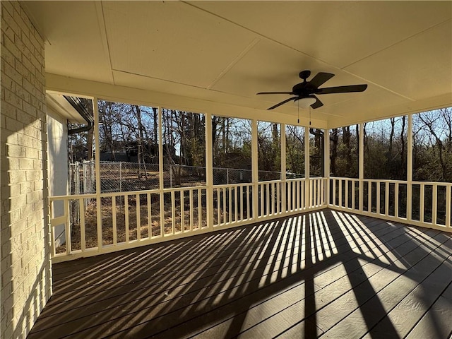 wooden terrace with ceiling fan