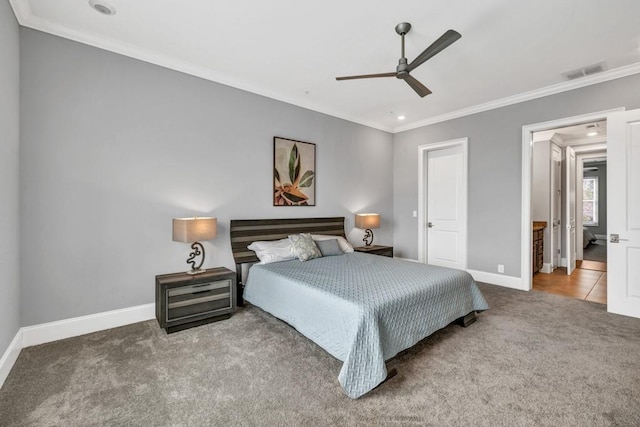 carpeted bedroom featuring recessed lighting, ornamental molding, baseboards, visible vents, and a ceiling fan