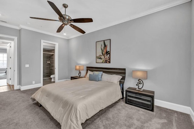bedroom with ensuite bathroom, baseboards, carpet floors, and ornamental molding