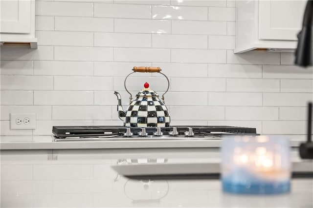 3 Hundley Ln, Roswell, GA 30076 - kitchen view of tasteful backsplash, white cabinetry, and light countertops