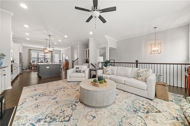 3 Hundley Ln, Roswell, GA 30076 - living area with a chandelier, ceiling fan, recessed lighting, crown molding, and dark wood finished floors