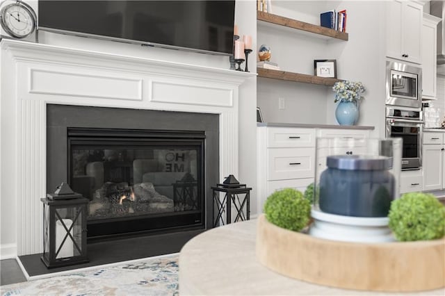 3 Hundley Ln, Roswell, GA 30076 - detailed view of stainless steel appliances and a glass covered fireplace