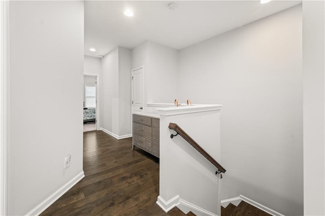 3 Hundley Ln, Roswell, GA 30076 - hall featuring dark wood-type flooring, baseboards, recessed lighting, and an upstairs landing