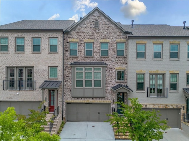 3 Hundley Ln, Roswell, GA 30076 - view of property with driveway, an attached garage, and brick siding