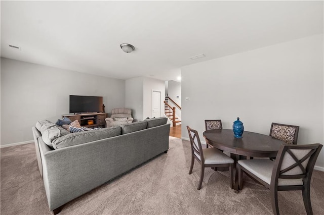 3 Hundley Ln, Roswell, GA 30076 - carpeted living room featuring stairs and baseboards