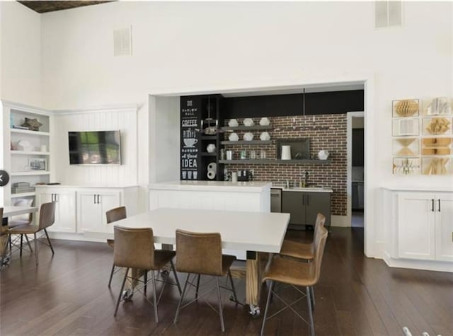 3 Hundley Ln, Roswell, GA 30076 - dining space featuring dark wood finished floors and a high ceiling