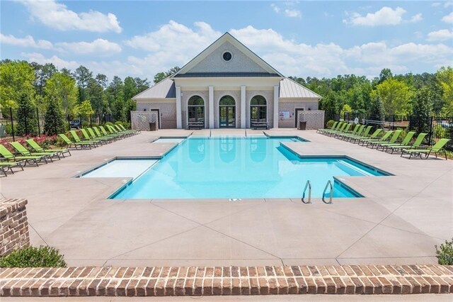3 Hundley Ln, Roswell, GA 30076 - community pool with a patio area and view of scattered trees