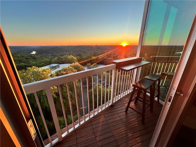 view of balcony at dusk