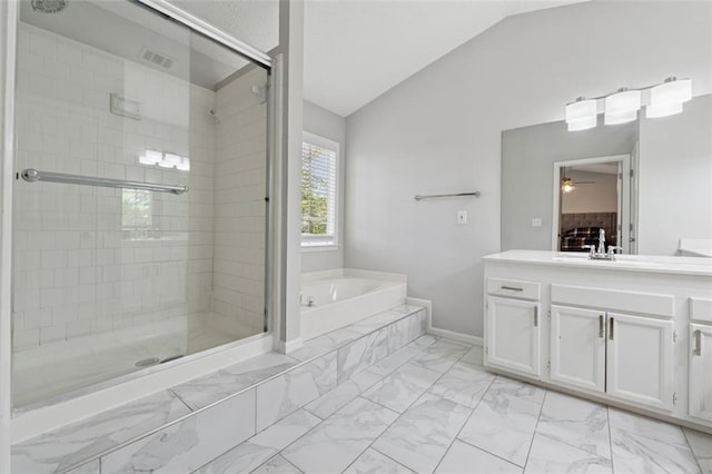 4147 Pinehurst Valley Dr, Decatur, GA 30034 - bathroom with a bath, vaulted ceiling, marble look tile flooring, vanity, and a shower stall