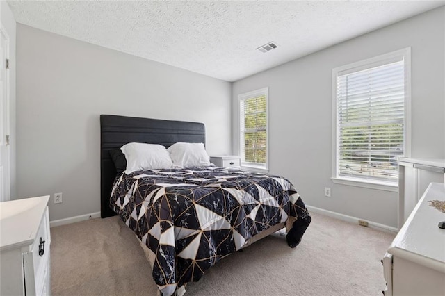 4147 Pinehurst Valley Dr, Decatur, GA 30034 - bedroom featuring light carpet, baseboards, and a textured ceiling