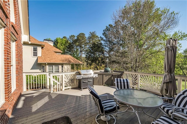 3855 Greenside Ct, Dacula, GA 30019 - deck with outdoor dining area and a grill