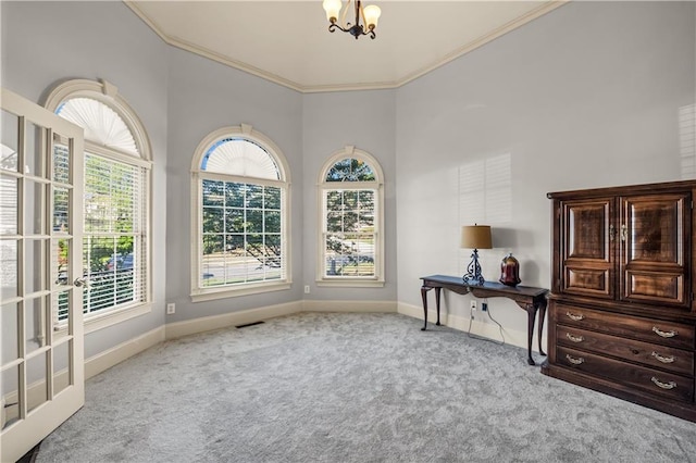 3855 Greenside Ct, Dacula, GA 30019 - interior space with a high ceiling, ornamental molding, a notable chandelier, and visible vents