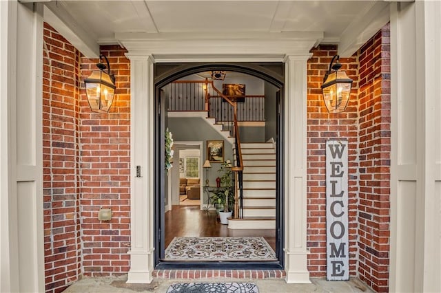 3855 Greenside Ct, Dacula, GA 30019 - property entrance featuring covered porch and brick siding
