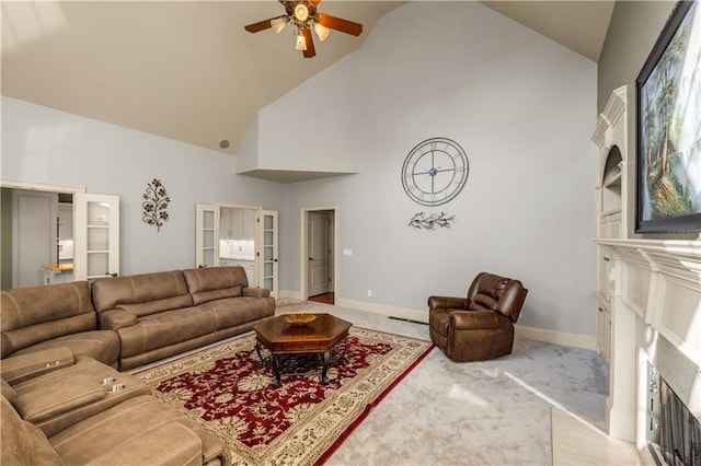 3855 Greenside Ct, Dacula, GA 30019 - living room featuring carpet floors, a fireplace, baseboards, ceiling fan, and high vaulted ceiling