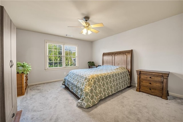 3855 Greenside Ct, Dacula, GA 30019 - bedroom with light colored carpet, a ceiling fan, baseboards, and visible vents