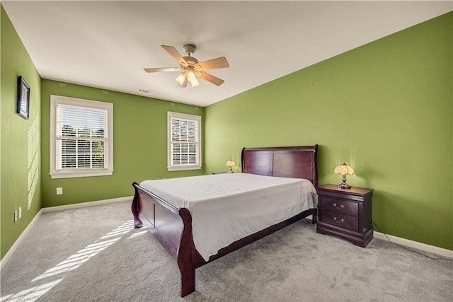 3855 Greenside Ct, Dacula, GA 30019 - carpeted bedroom with baseboards, a ceiling fan, and visible vents