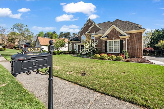 3855 Greenside Ct, Dacula, GA 30019 - view of front facade with brick siding and a front lawn