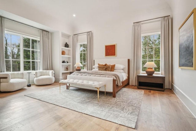 bedroom with light hardwood / wood-style floors