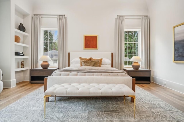 bedroom with light wood-type flooring