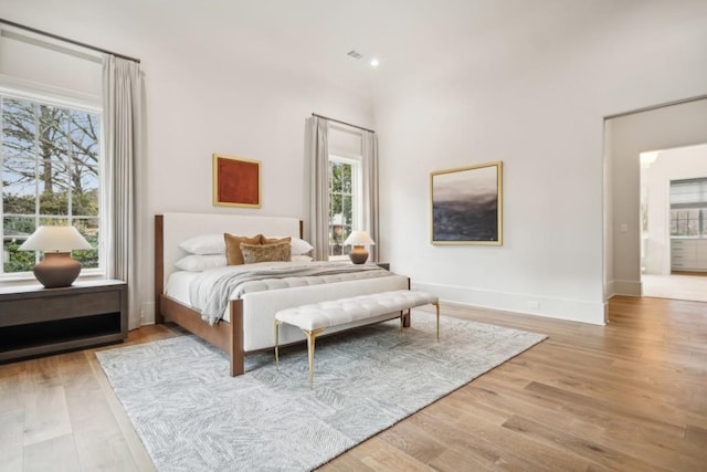 bedroom with light hardwood / wood-style floors