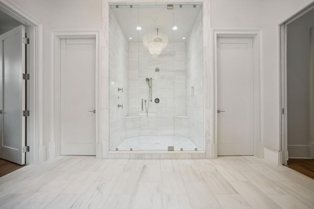 bathroom featuring an enclosed shower