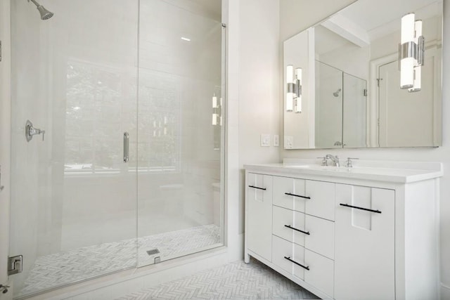 bathroom featuring vanity and walk in shower