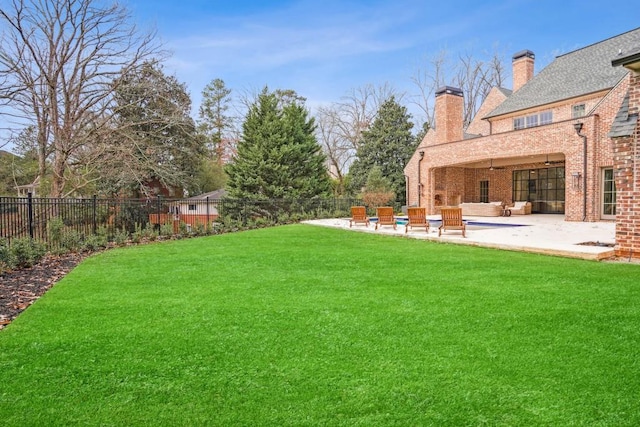 view of yard with a patio area