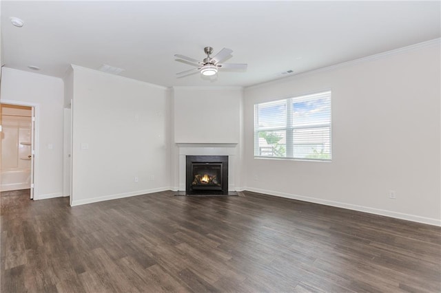 6706 Moondancer Ct, Flowery Branch, GA 30542 - unfurnished living room with crown molding, a fireplace with flush hearth, dark wood-type flooring, and ceiling fan