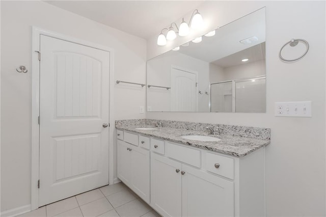 6706 Moondancer Ct, Flowery Branch, GA 30542 - bathroom with double vanity, a stall shower, and tile patterned flooring