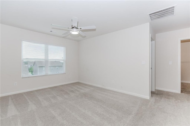 6706 Moondancer Ct, Flowery Branch, GA 30542 - spare room featuring light carpet and a ceiling fan