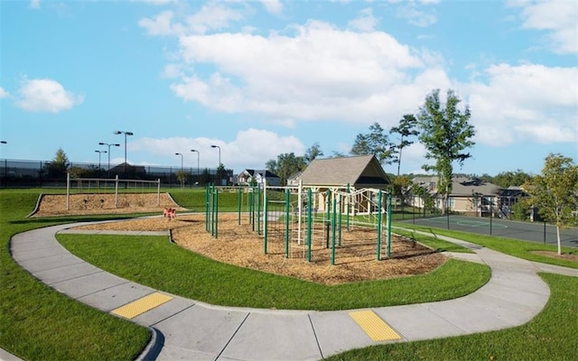 6706 Moondancer Ct, Flowery Branch, GA 30542 - community jungle gym featuring a lawn