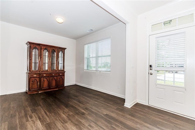 6706 Moondancer Ct, Flowery Branch, GA 30542 - foyer entrance featuring crown molding and dark wood finished floors