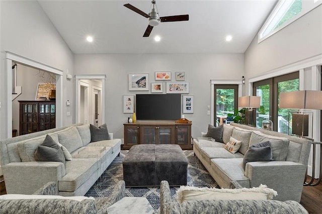 living room featuring dark wood-type flooring, recessed lighting, high vaulted ceiling, and a ceiling fan