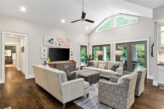 living area featuring dark wood-style flooring, french doors, recessed lighting, high vaulted ceiling, and baseboards