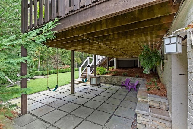 view of patio / terrace featuring stairs